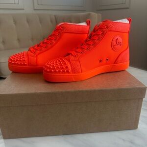 Christian Louboutin Orange Spiked Sneakers